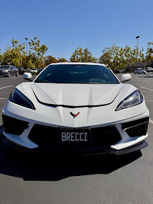 White Corvette with a glossy ceramic-coated finish